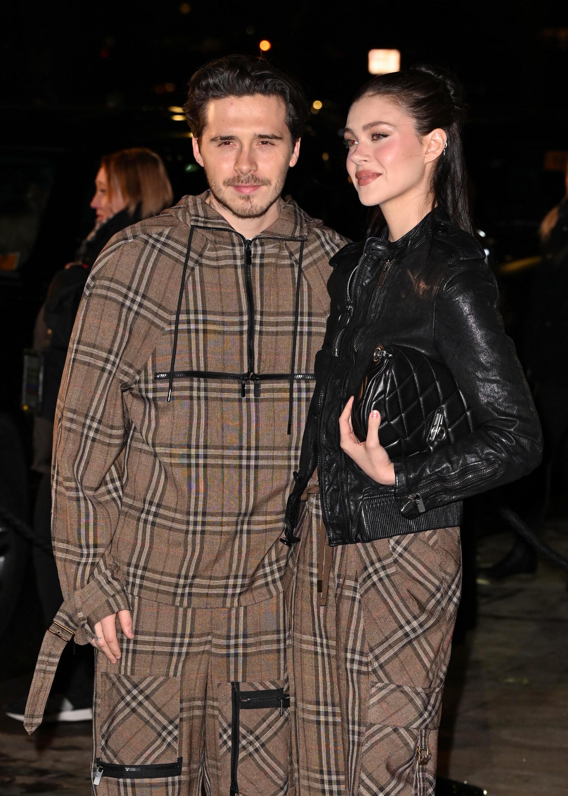 Brooklyn Beckham and Nicola Peltz smiling