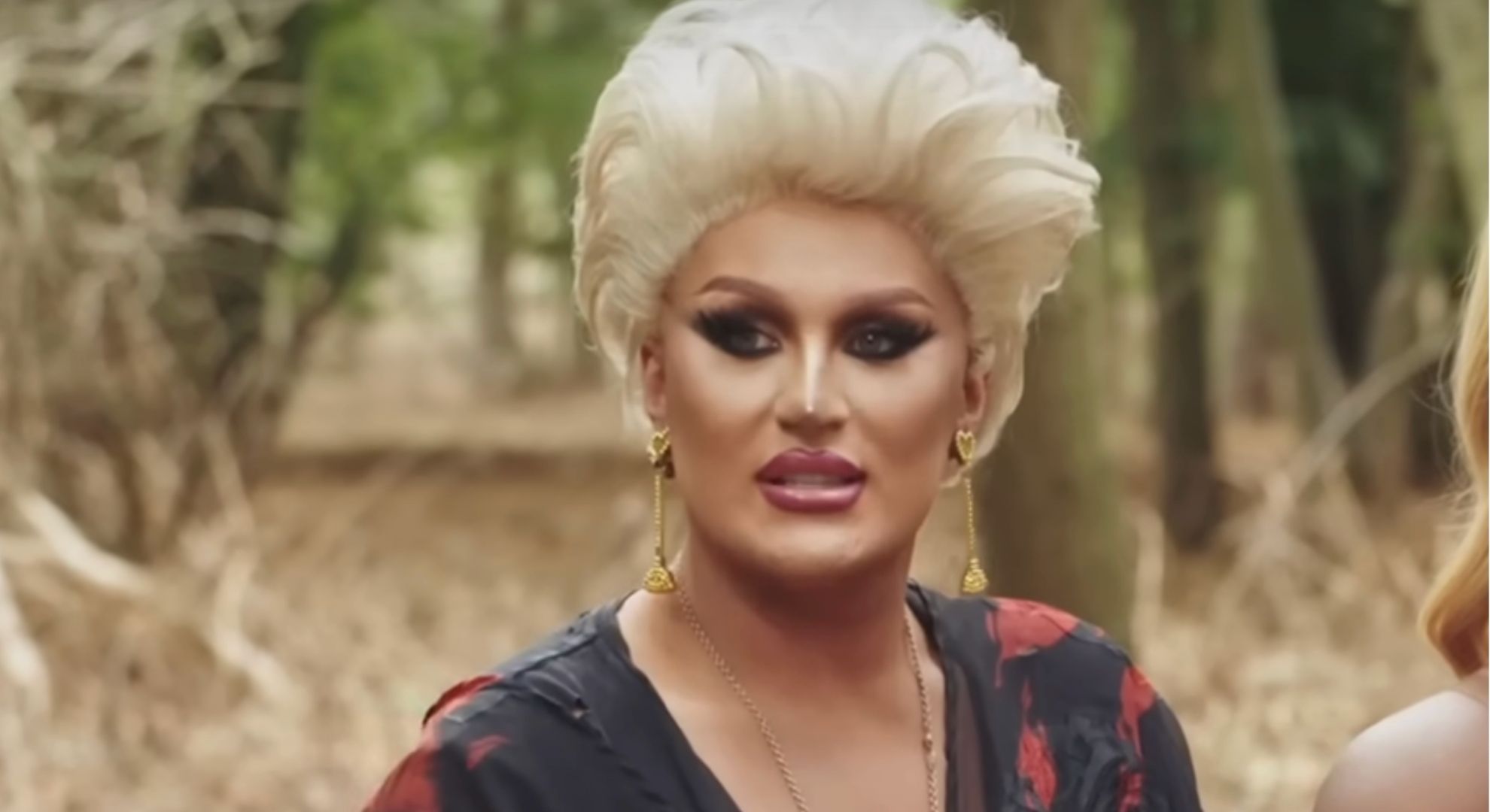 The Vivienne smirking