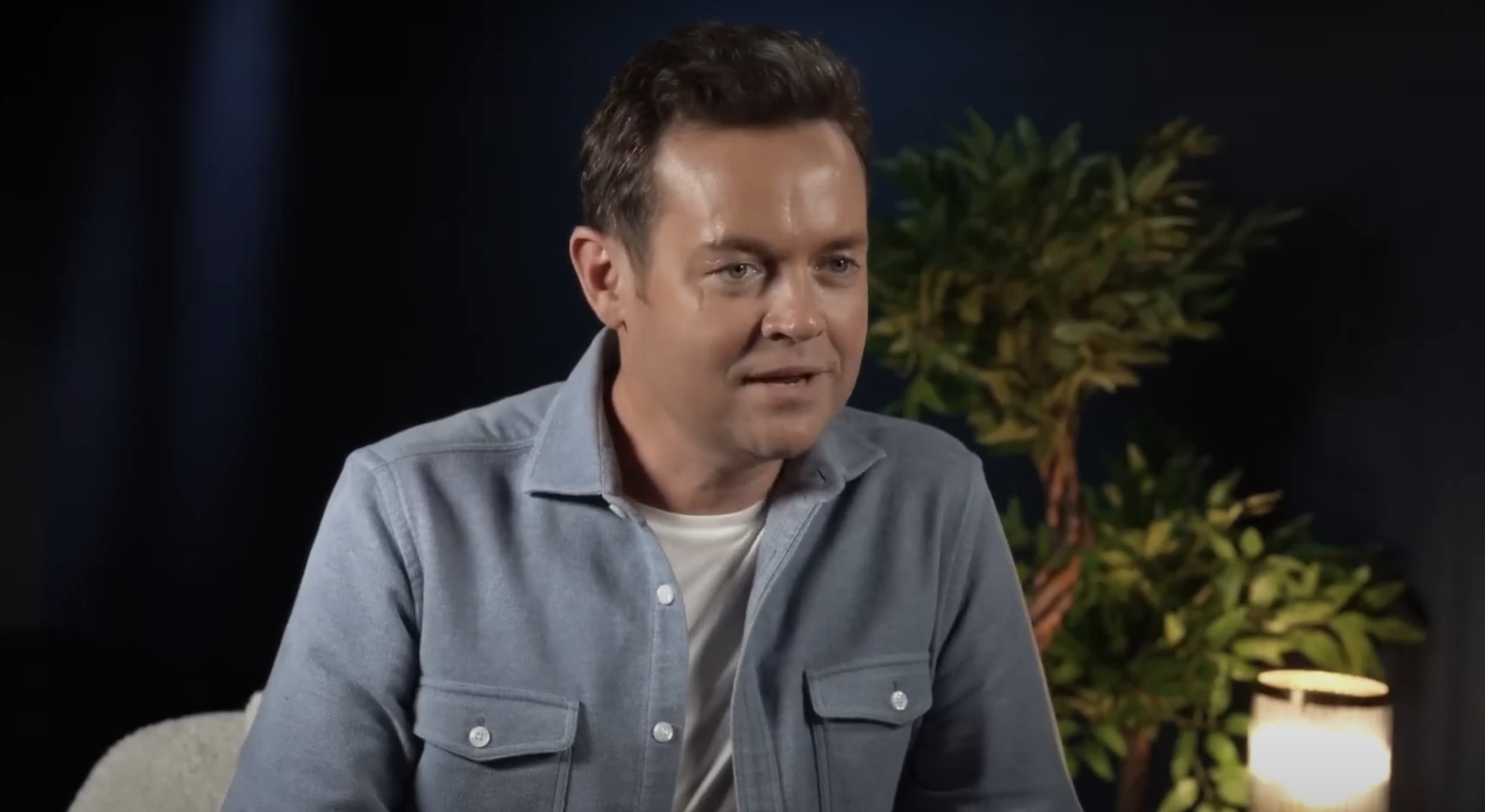 Stephen Mulhern in a blue shirt and white T-shirt