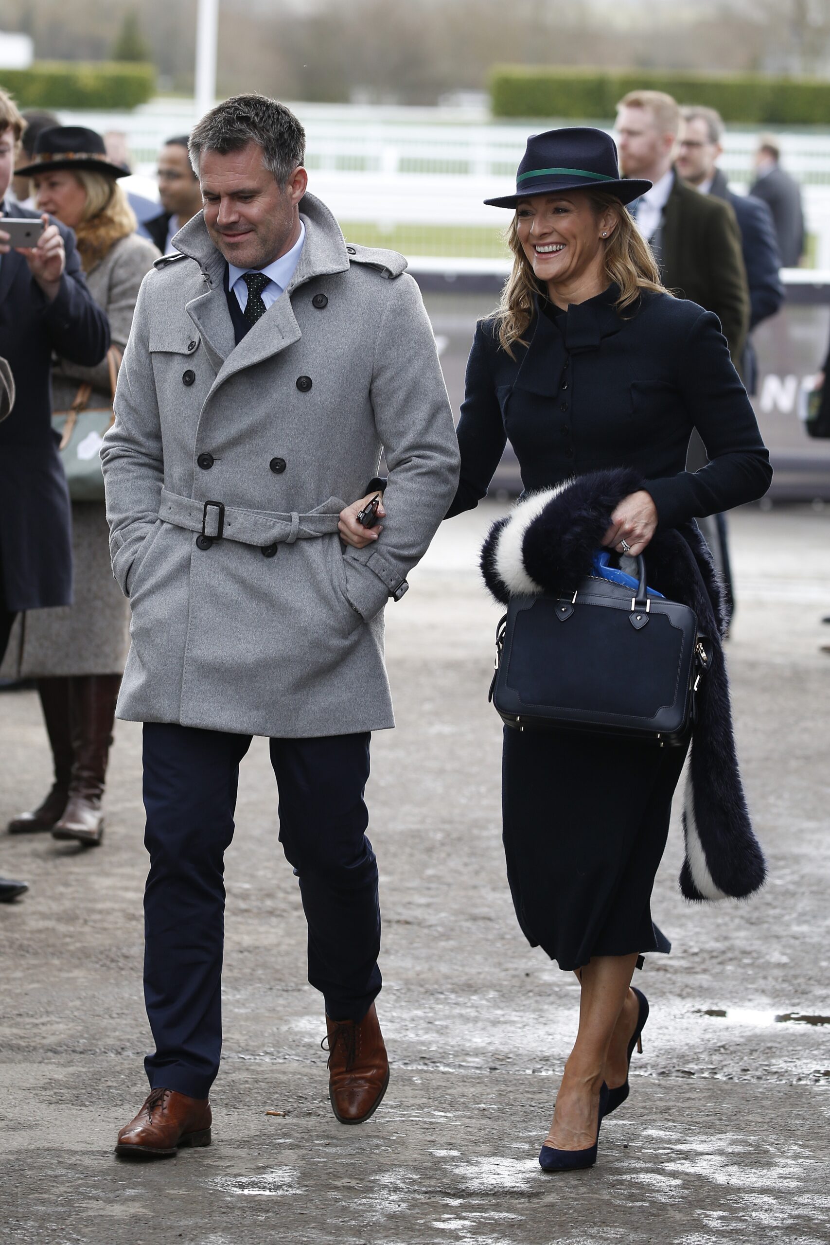 Gabby and Kenny Logan walking hand in hand