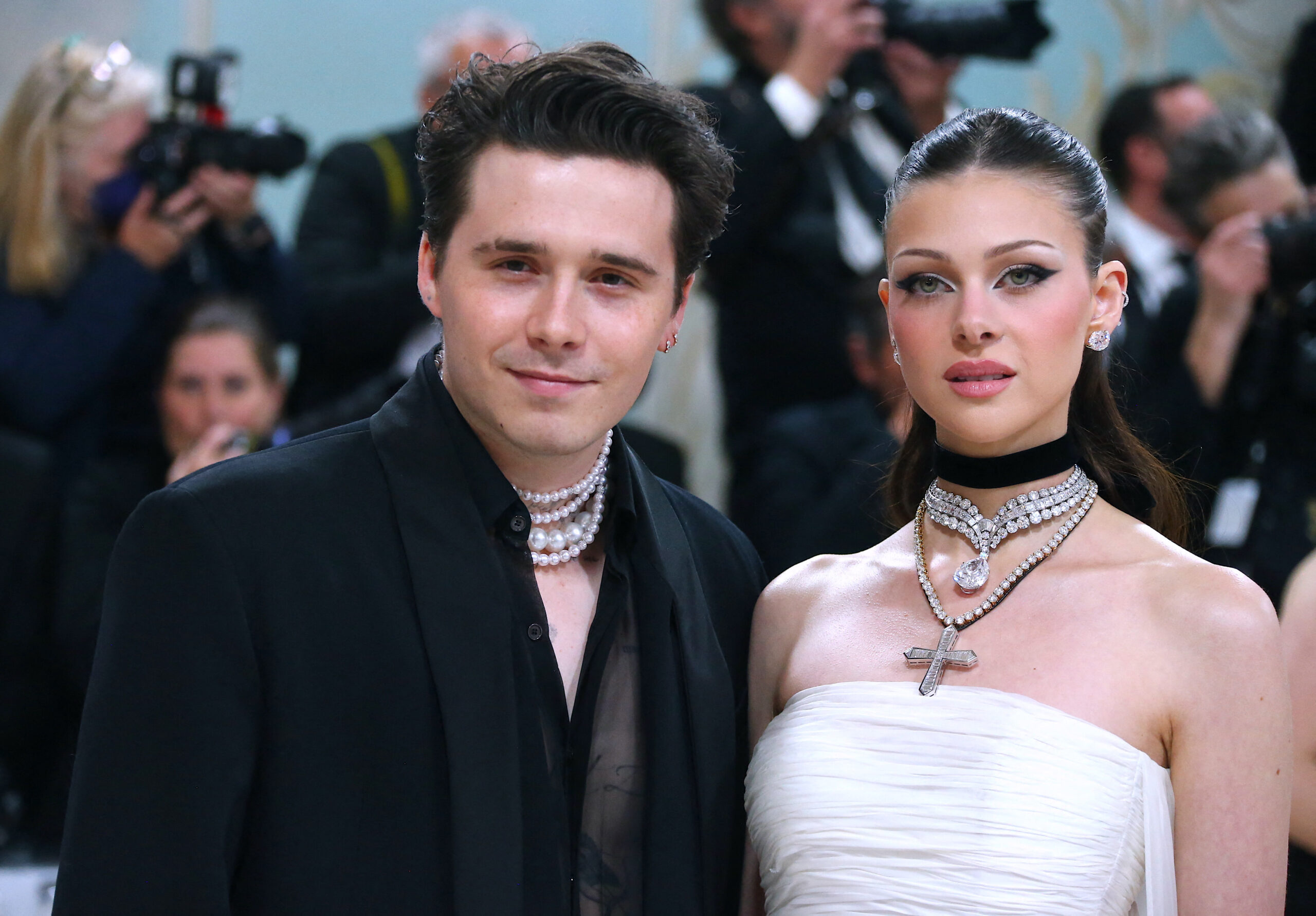 Brooklyn and Nicola Beckham at event