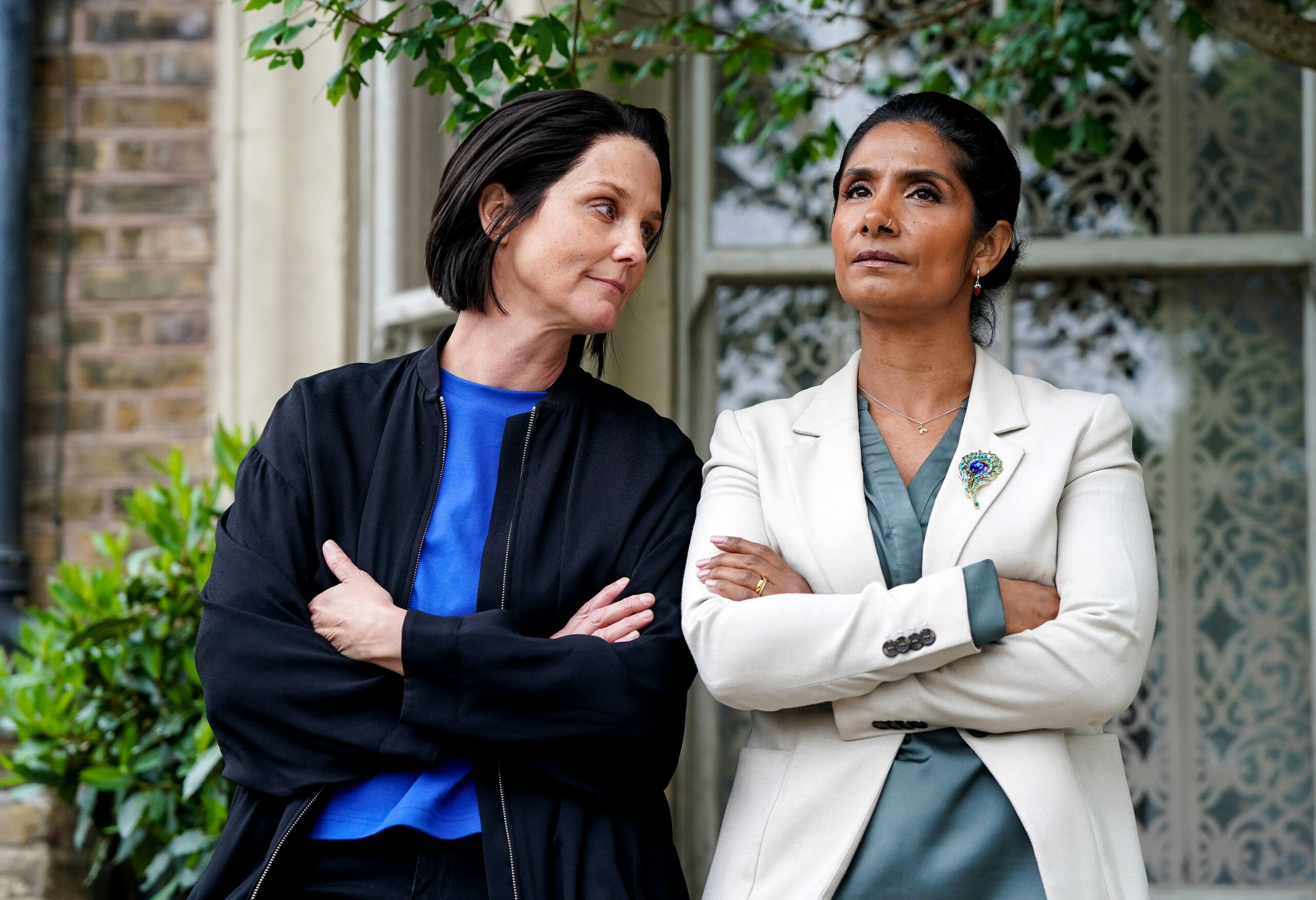 Suki and Eve stand side by side on EastEnders