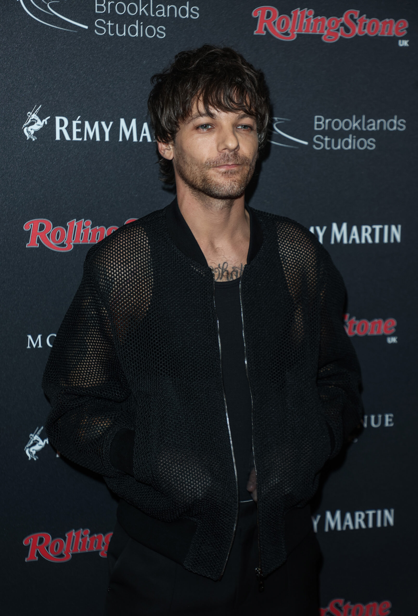 Louis Tomlinson at event 