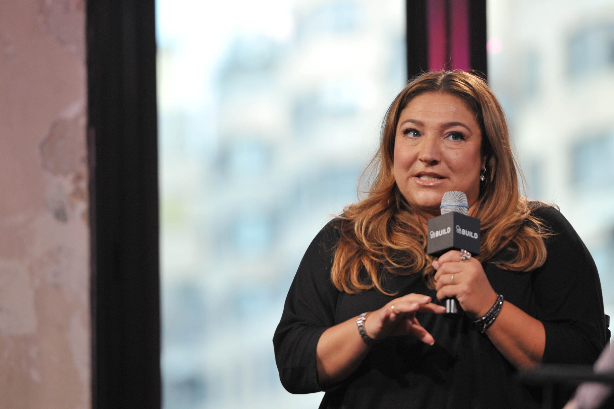Jo Frost speaking in a microphone