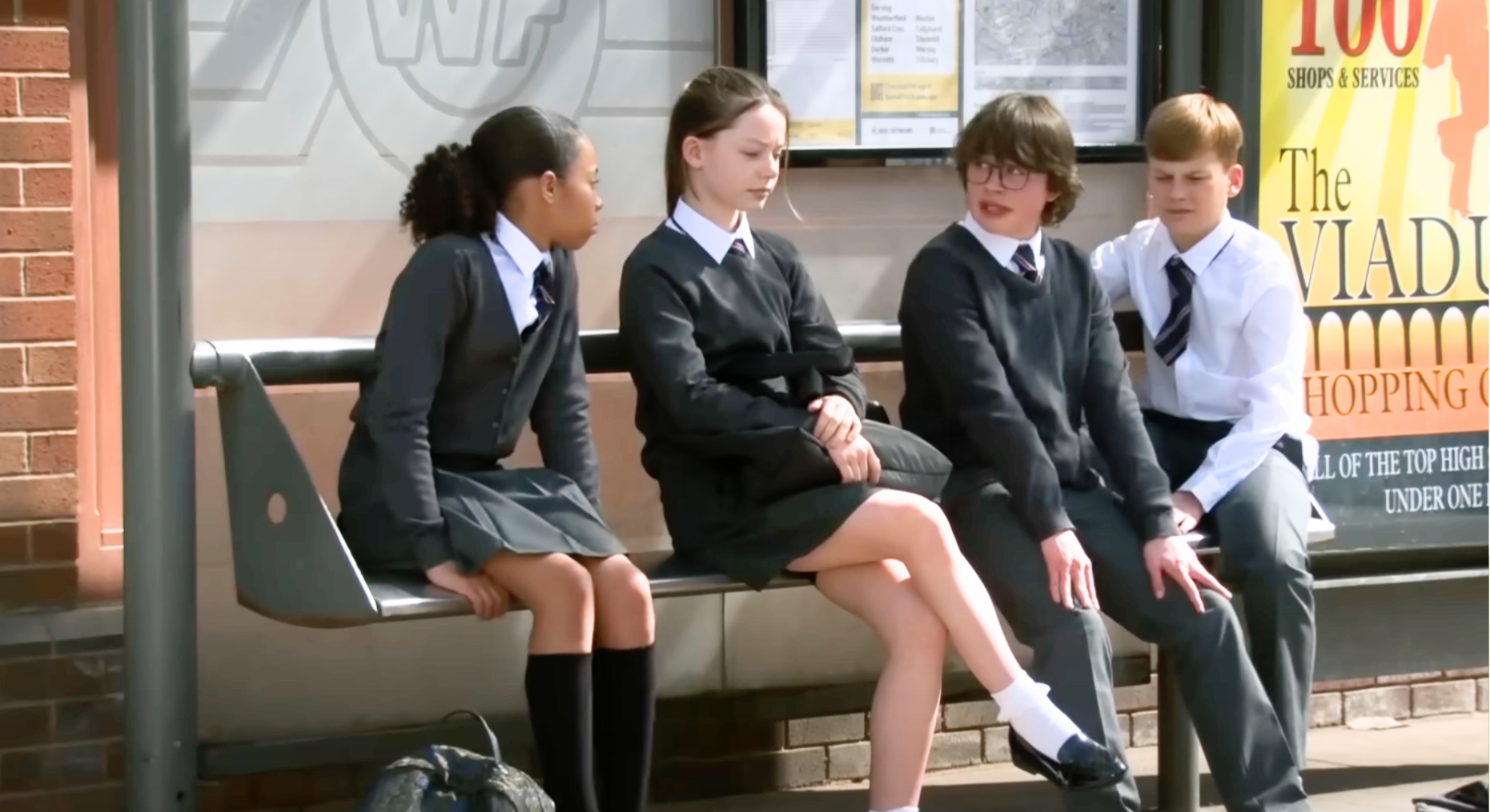 Coronation Street's Ruby, Lily, Sam and Jake at bus stop