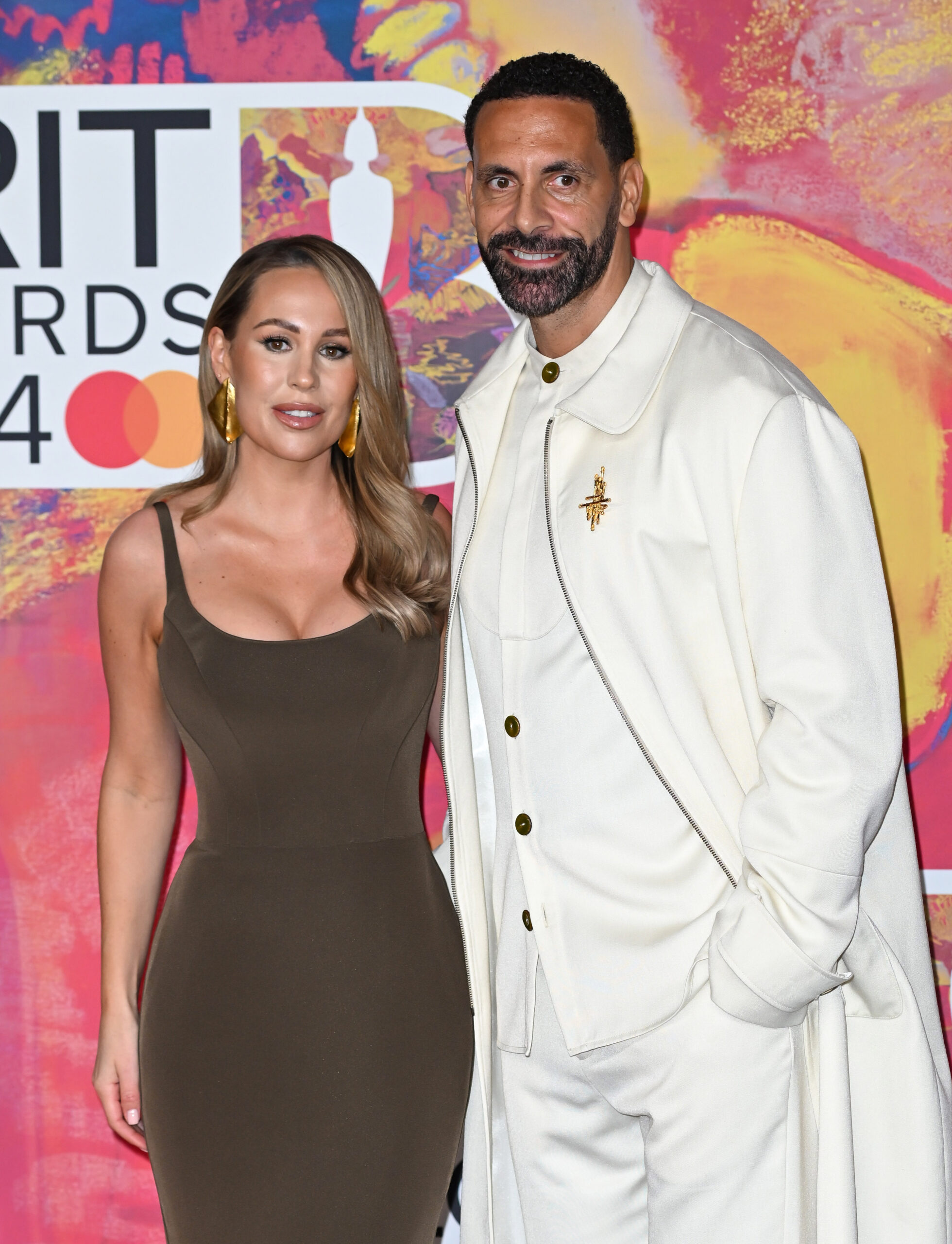 Kate and Rio Ferdinand on the red carpet of an event