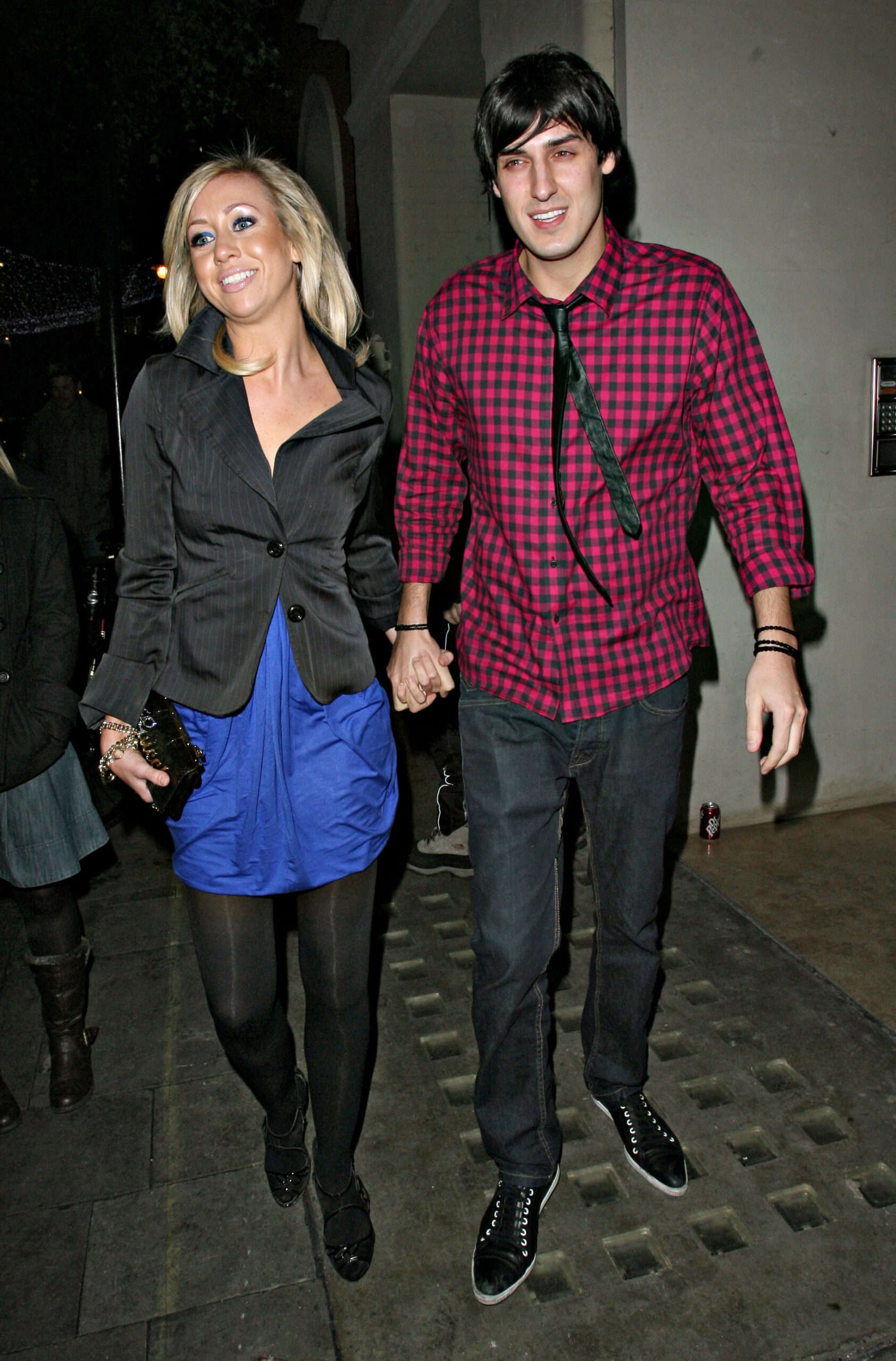 Grace Adams-Short and Mikey Dalton holding hands