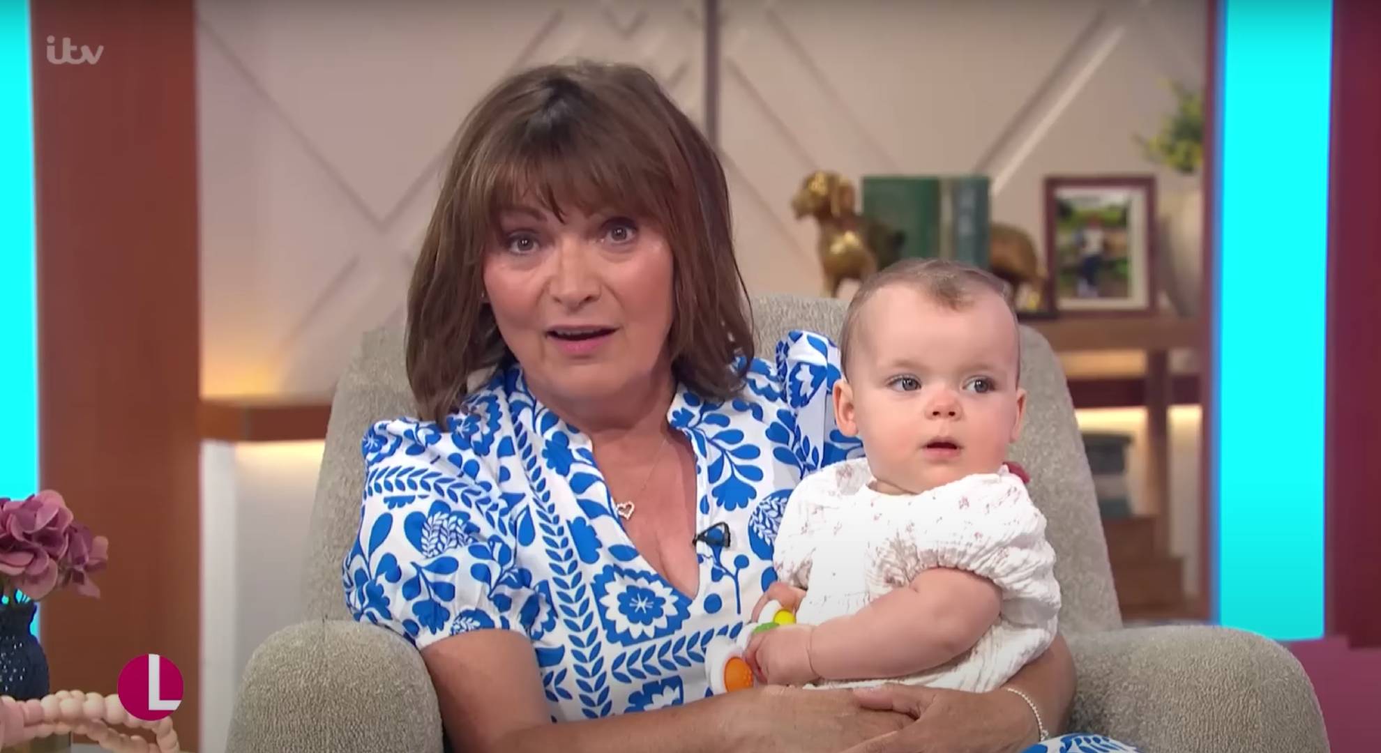 Lorraine holds her granddaughter