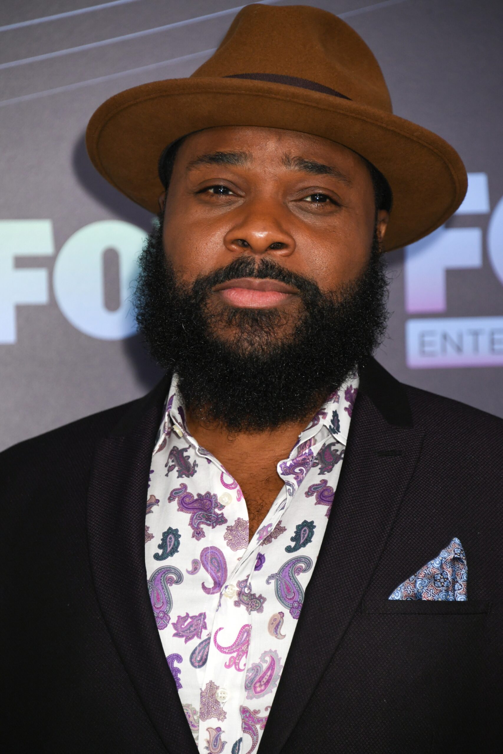 Malcolm-Jamal Warner in a hat posing