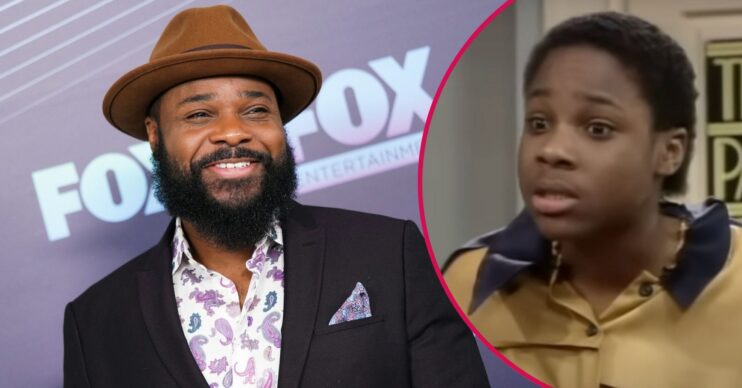 Malcolm-Jamal Warner smiling / on The Cosby Show