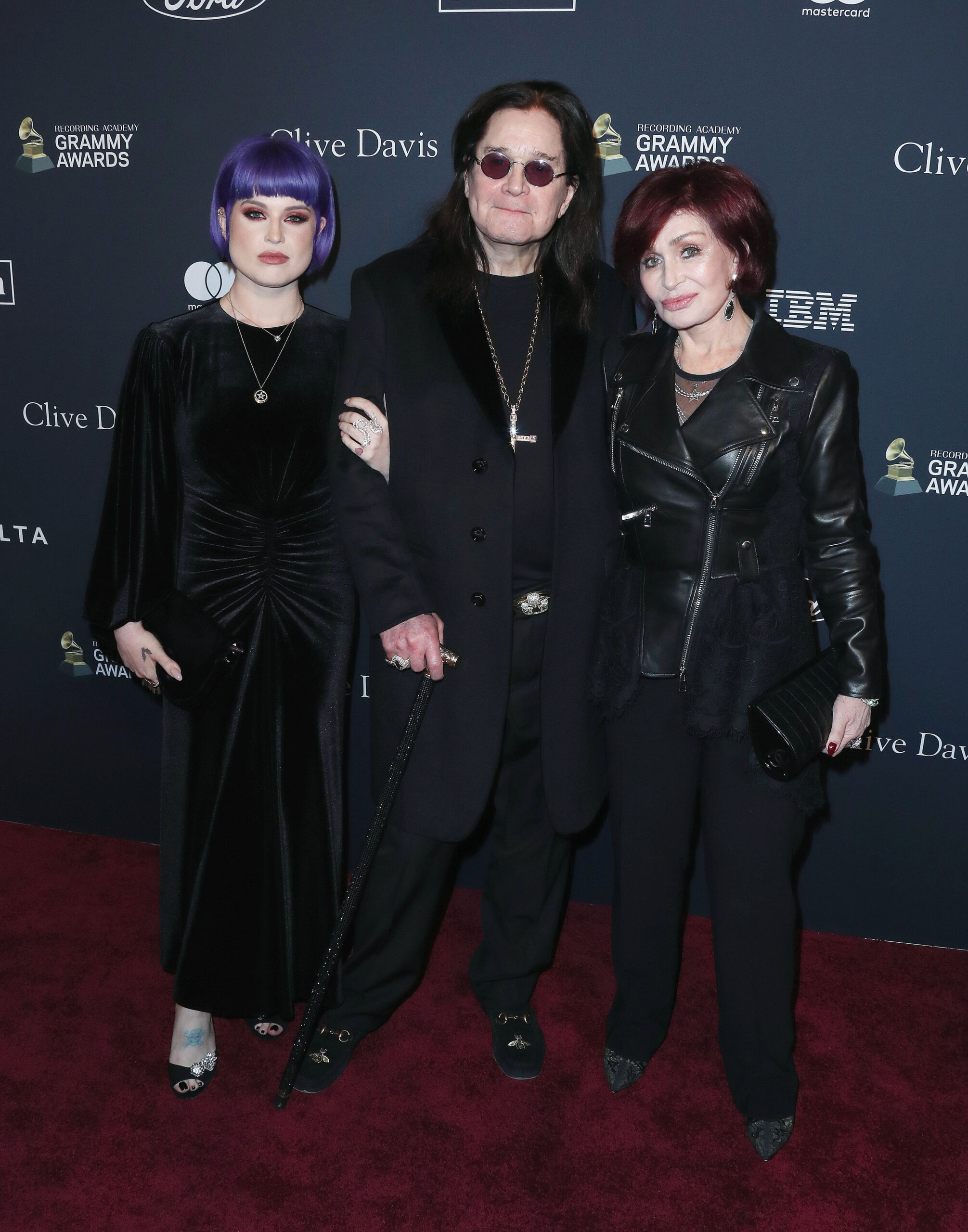 Kelly, Ozzy, and Sharon Osbourne on the red carpet