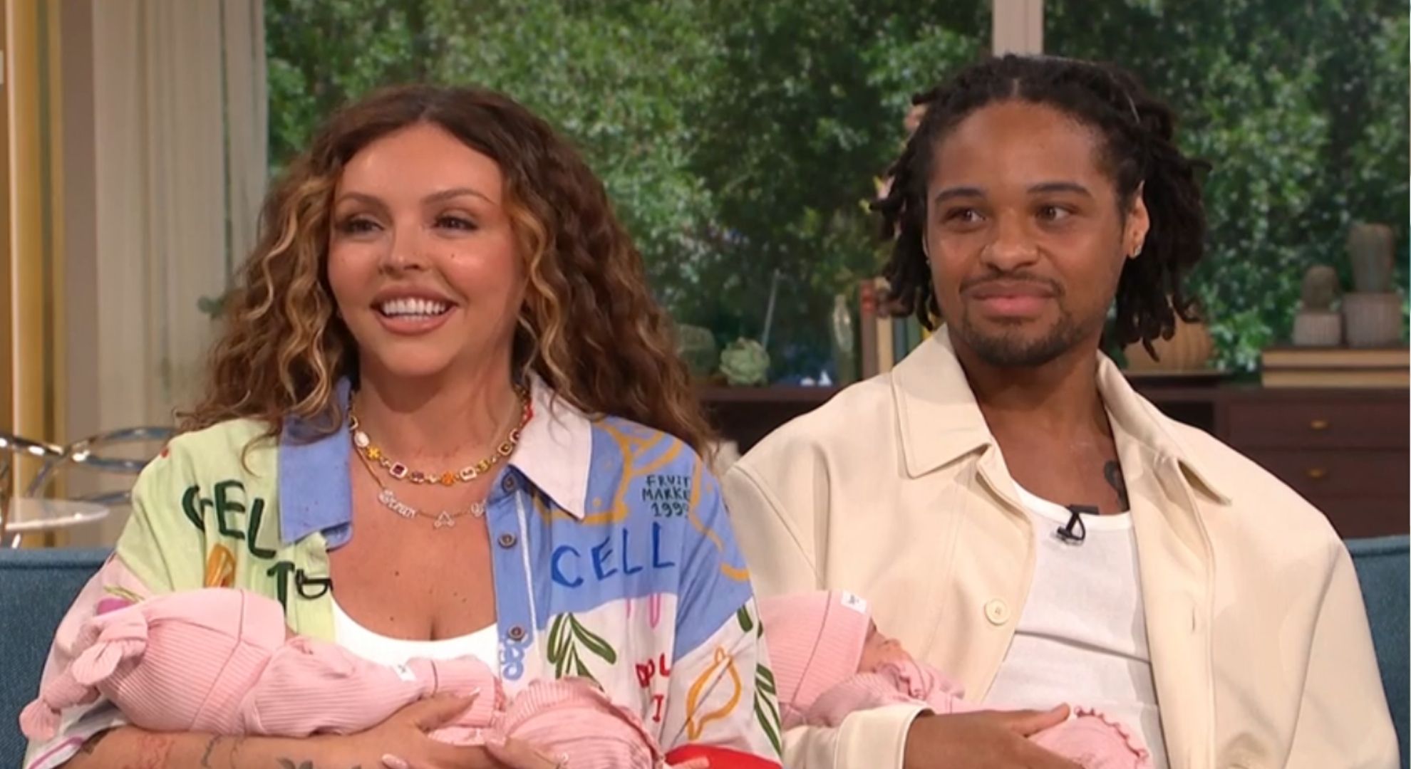 Jesy Nelson and Zion Foster smiling with their twins