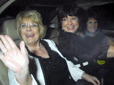 Ozzy Osbourne's sisters smiling