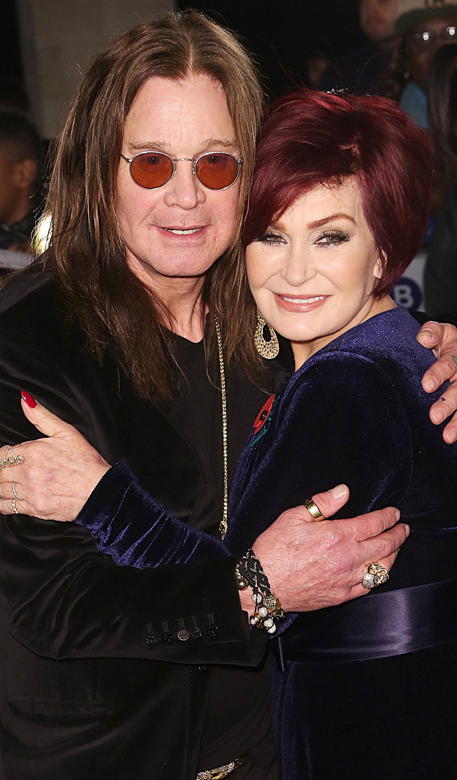 Ozzy Osbourne embraces wife Sharon