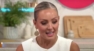 Amy Dowden looks downwards