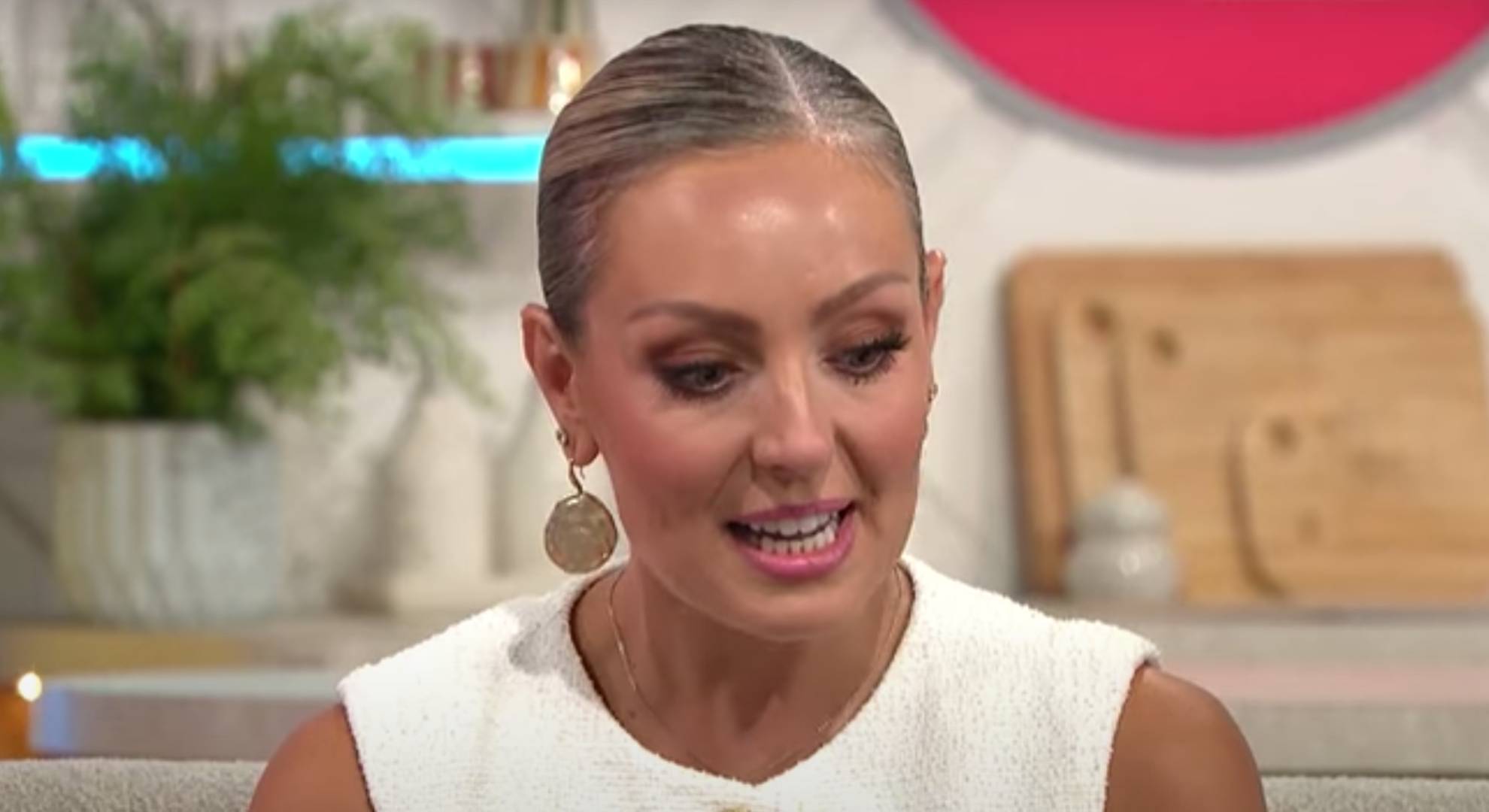 Amy Dowden looks downwards