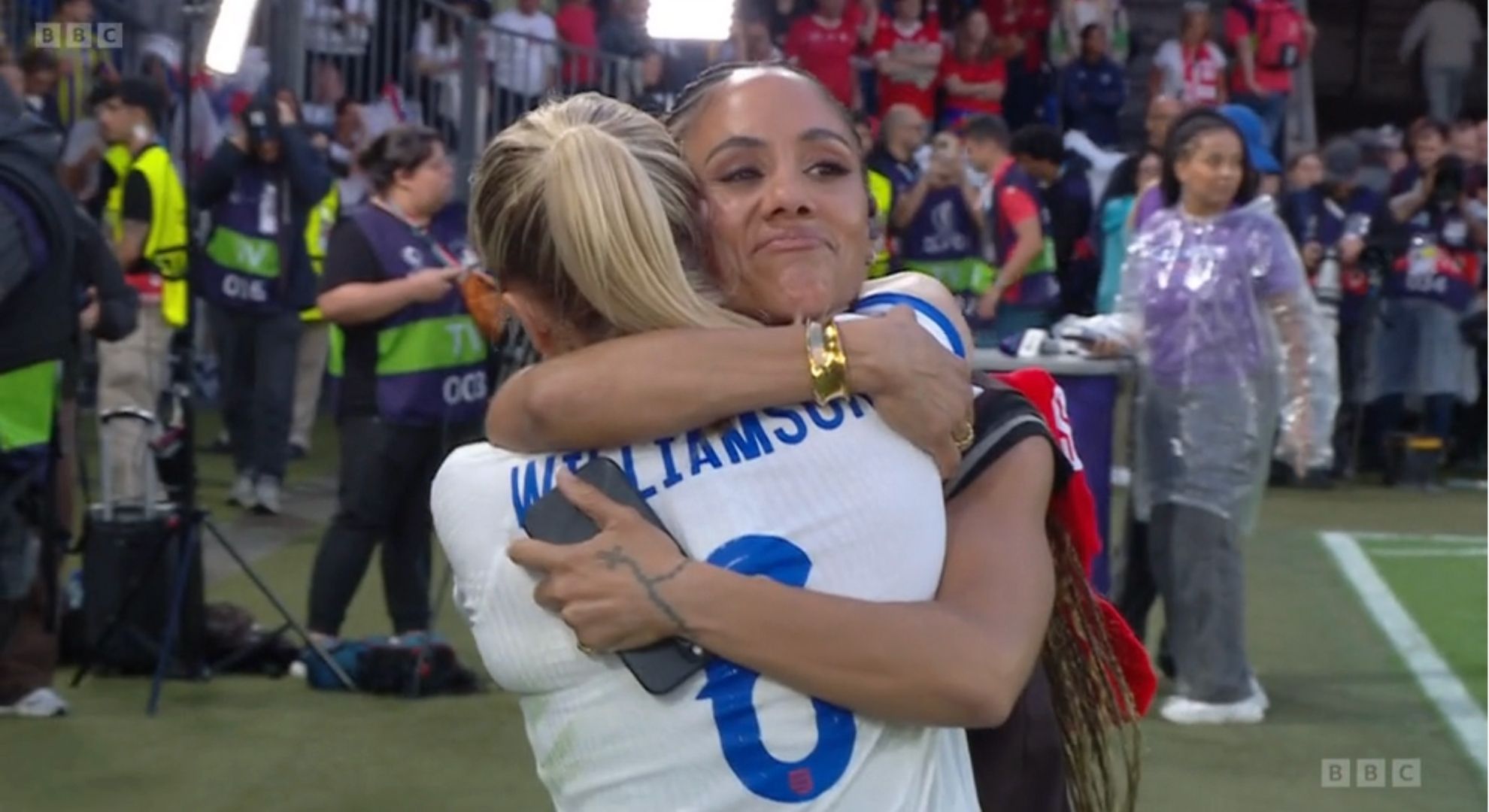 Alex Scott hugging Leah Williamson