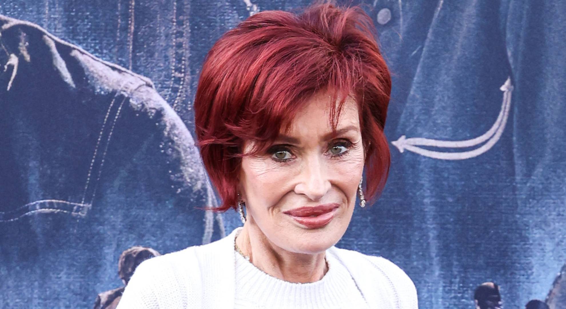 Sharon Osbourne smiles
