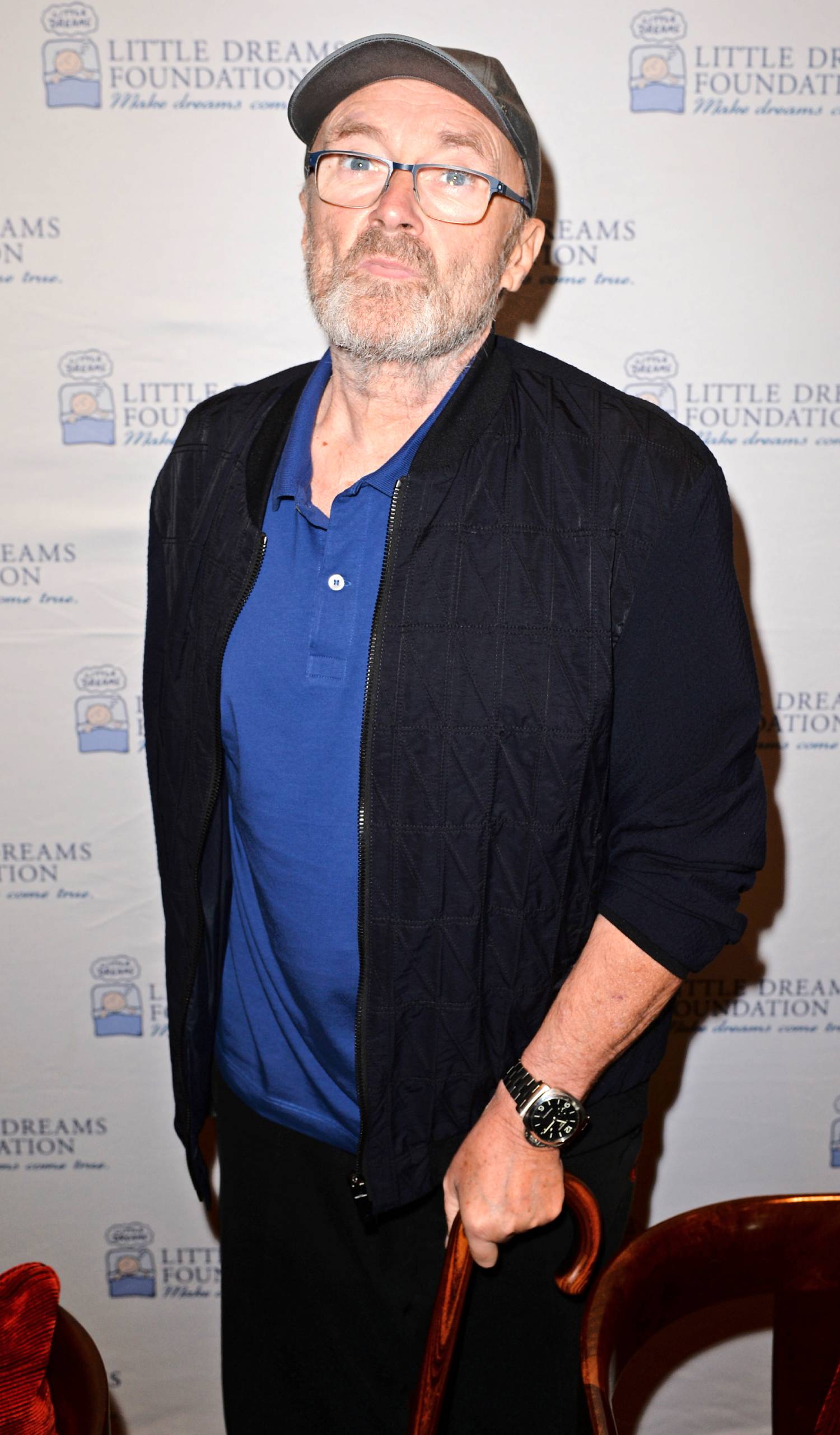 Phil Collins looks upwards