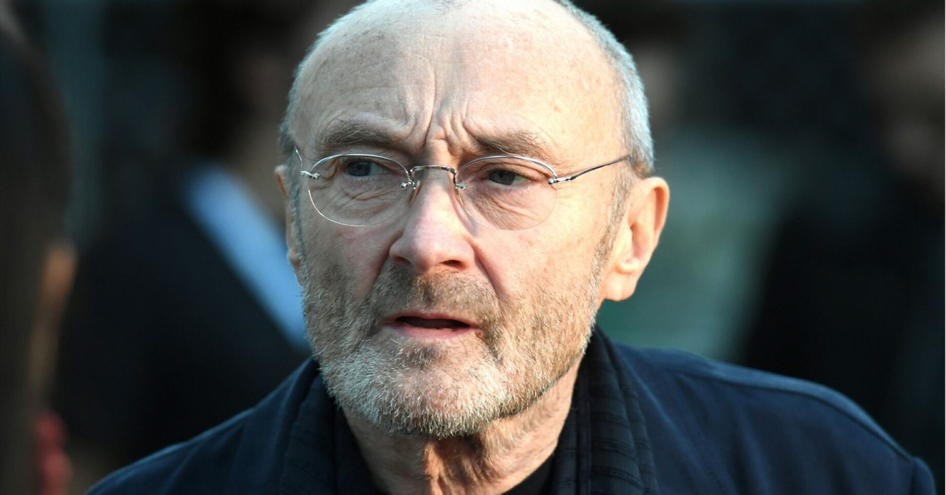 Phil Collins looks serious