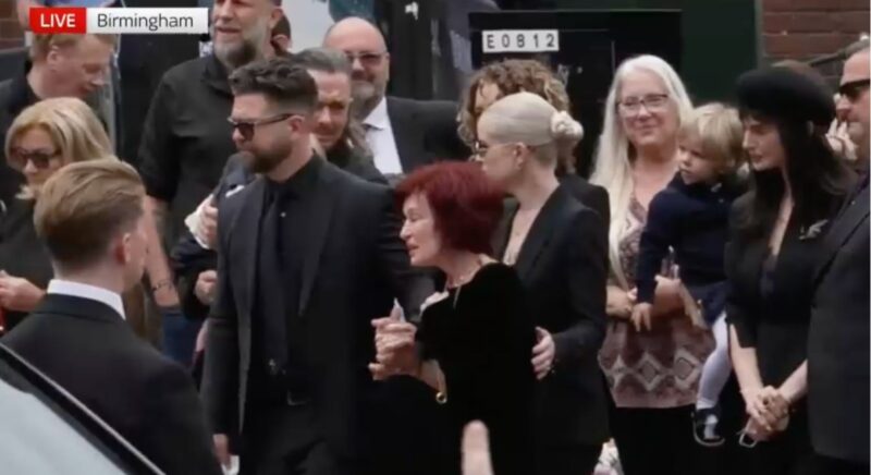 The Osbourne family crying at Ozzy's funeral