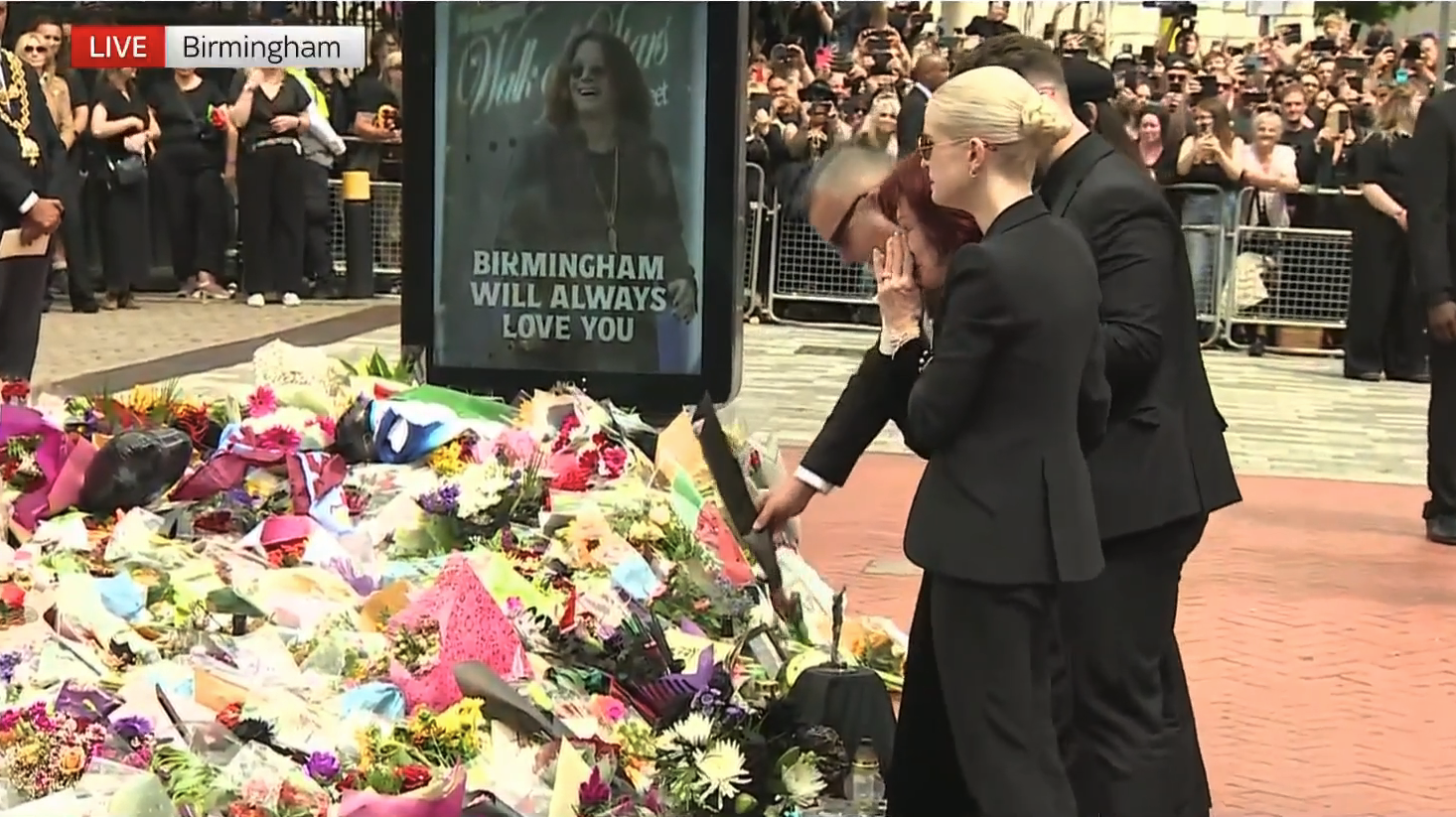 Sharon Osbourne visited floral tributes left for her husband (Credit: BBC)
