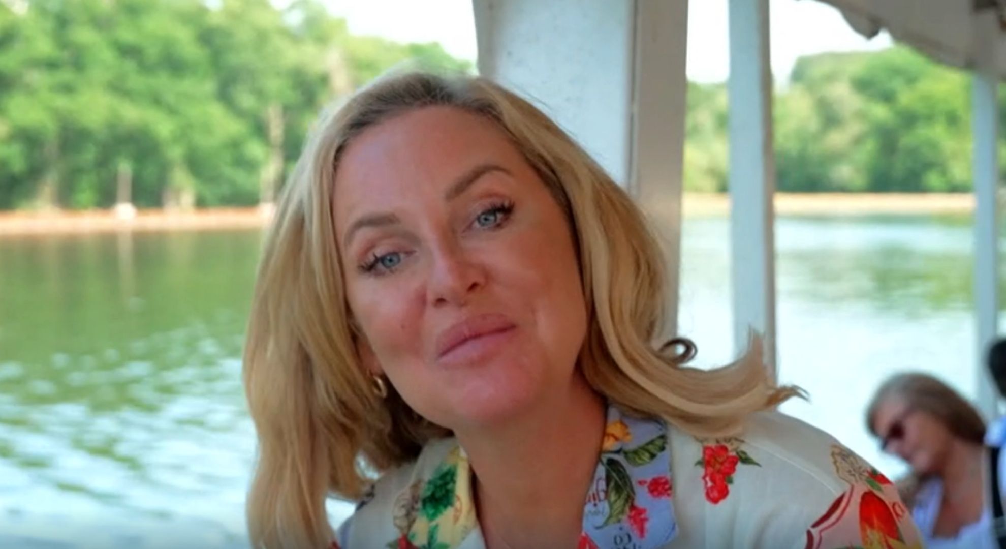 Josie Gibson smiling on a boat cruise