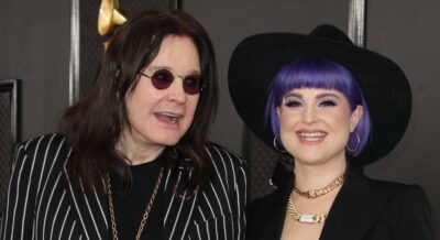 Kelly Osbourne and Ozzy Osbourne smiling together