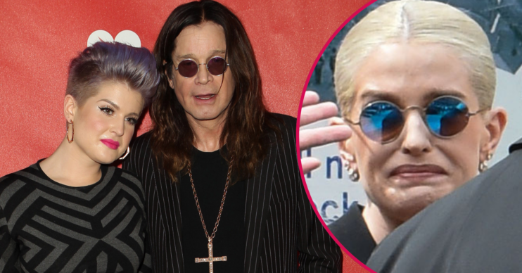 Kelly Osbourne and Ozzy Osbourne standing together