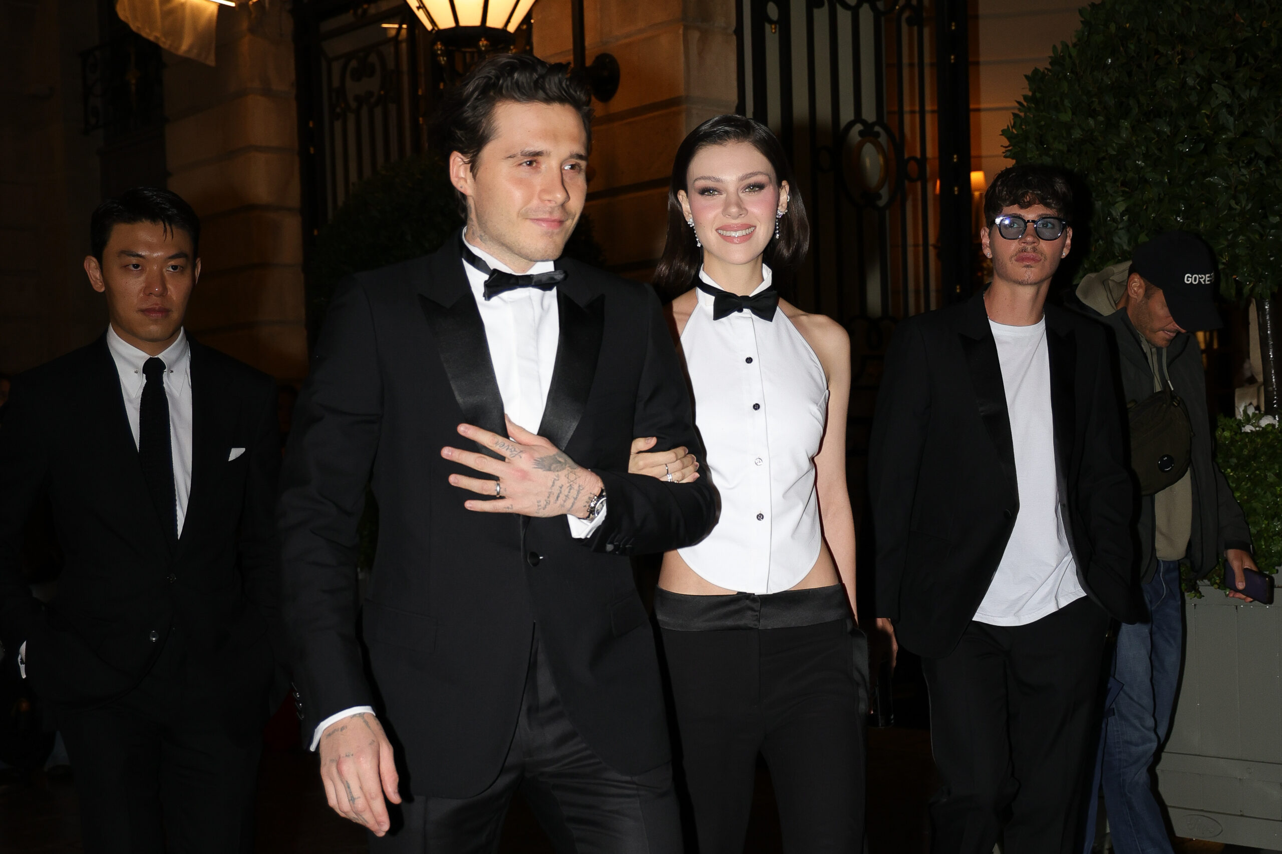 Brooklyn Beckham and Nicola Peltz smiling