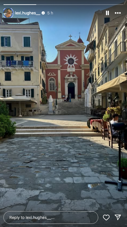 Greek village with cobbled streets and a church