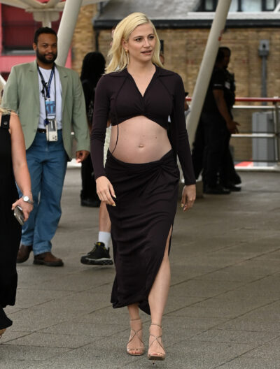 Pregnant Pixie Lott walking