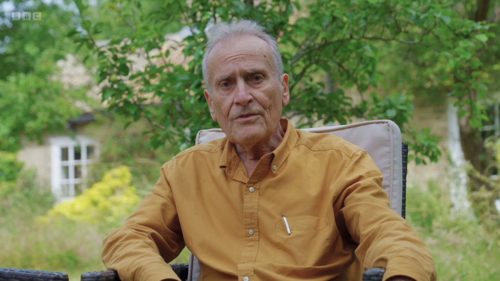 Steve speaking on Gardeners' World in a mustard shirt