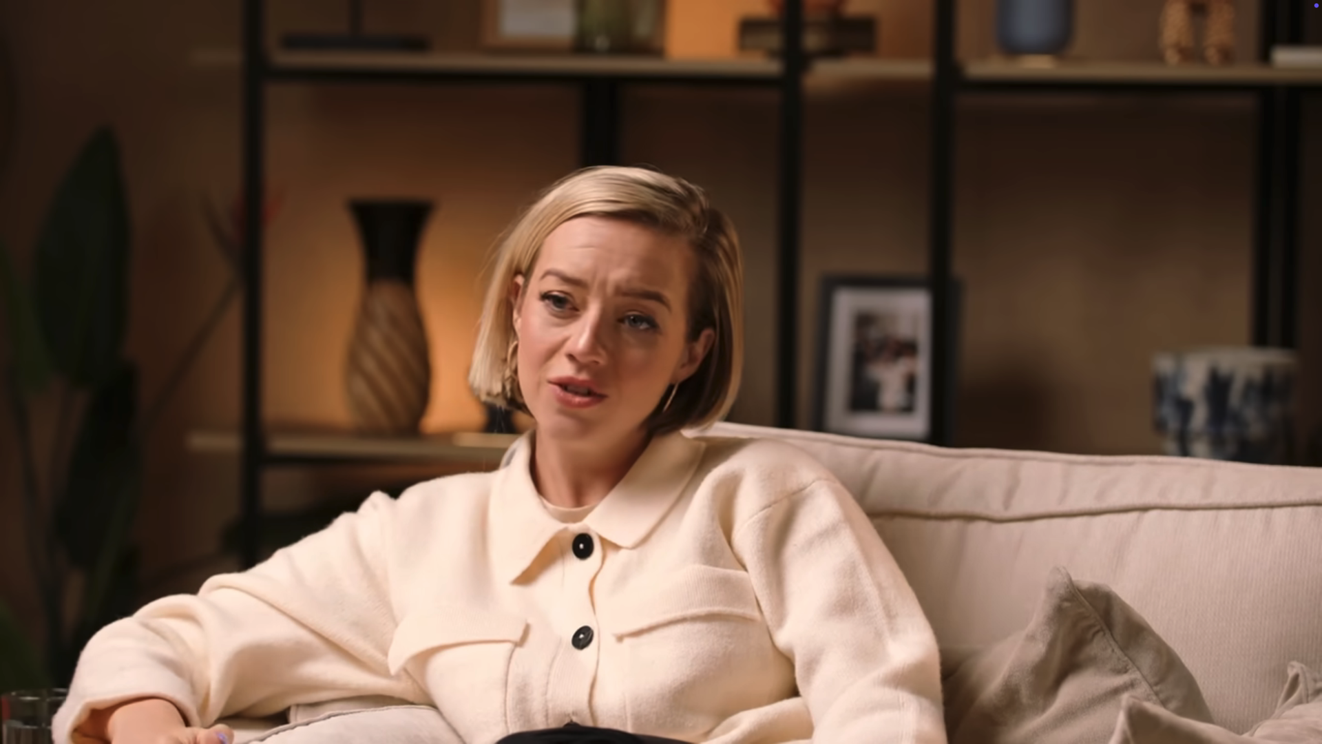 Kelsey Parker in a beige top