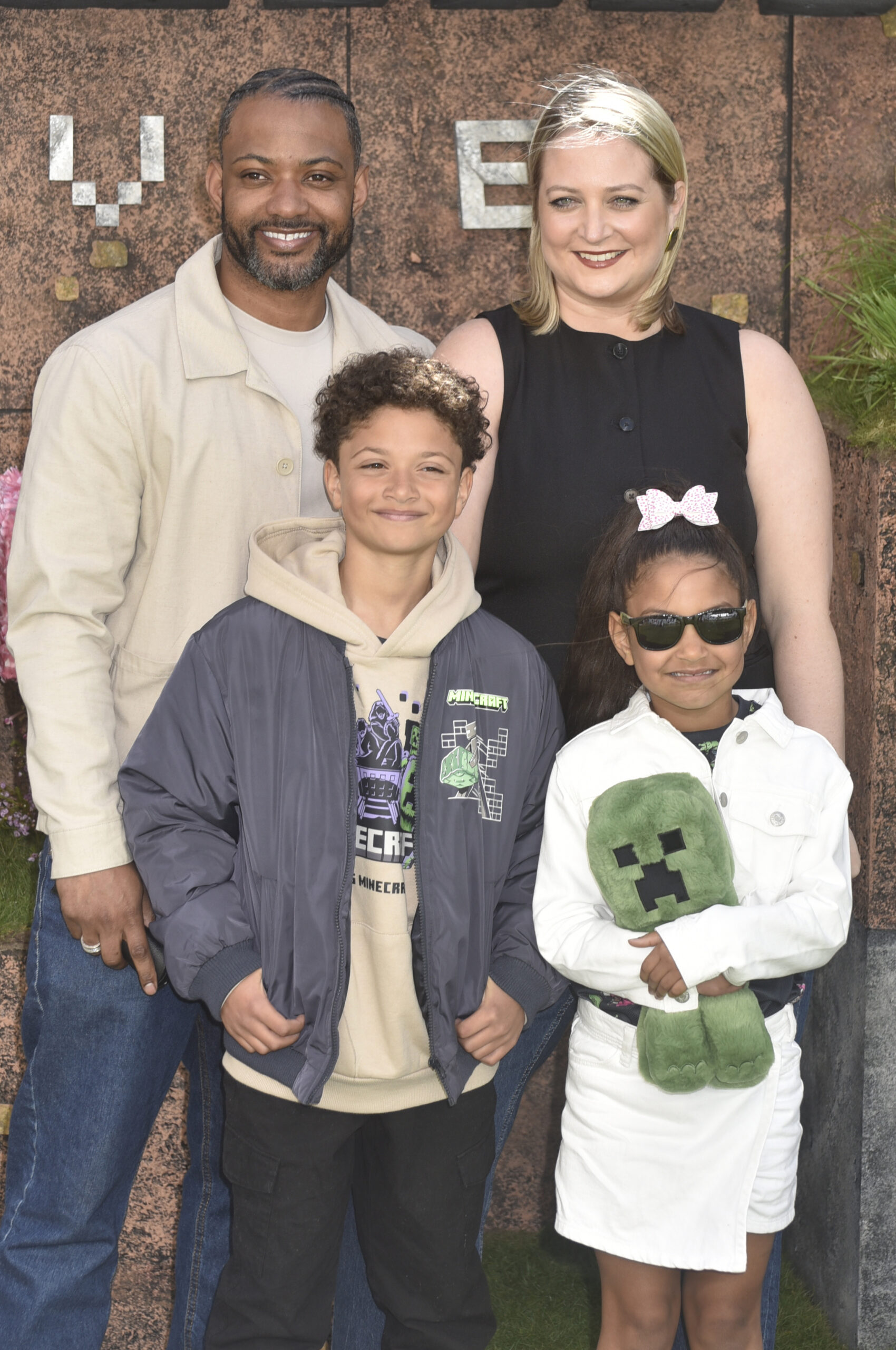 JB Gill and wife Chloe with their two kids