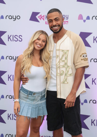 Molly Rainford and Tyler West smiling