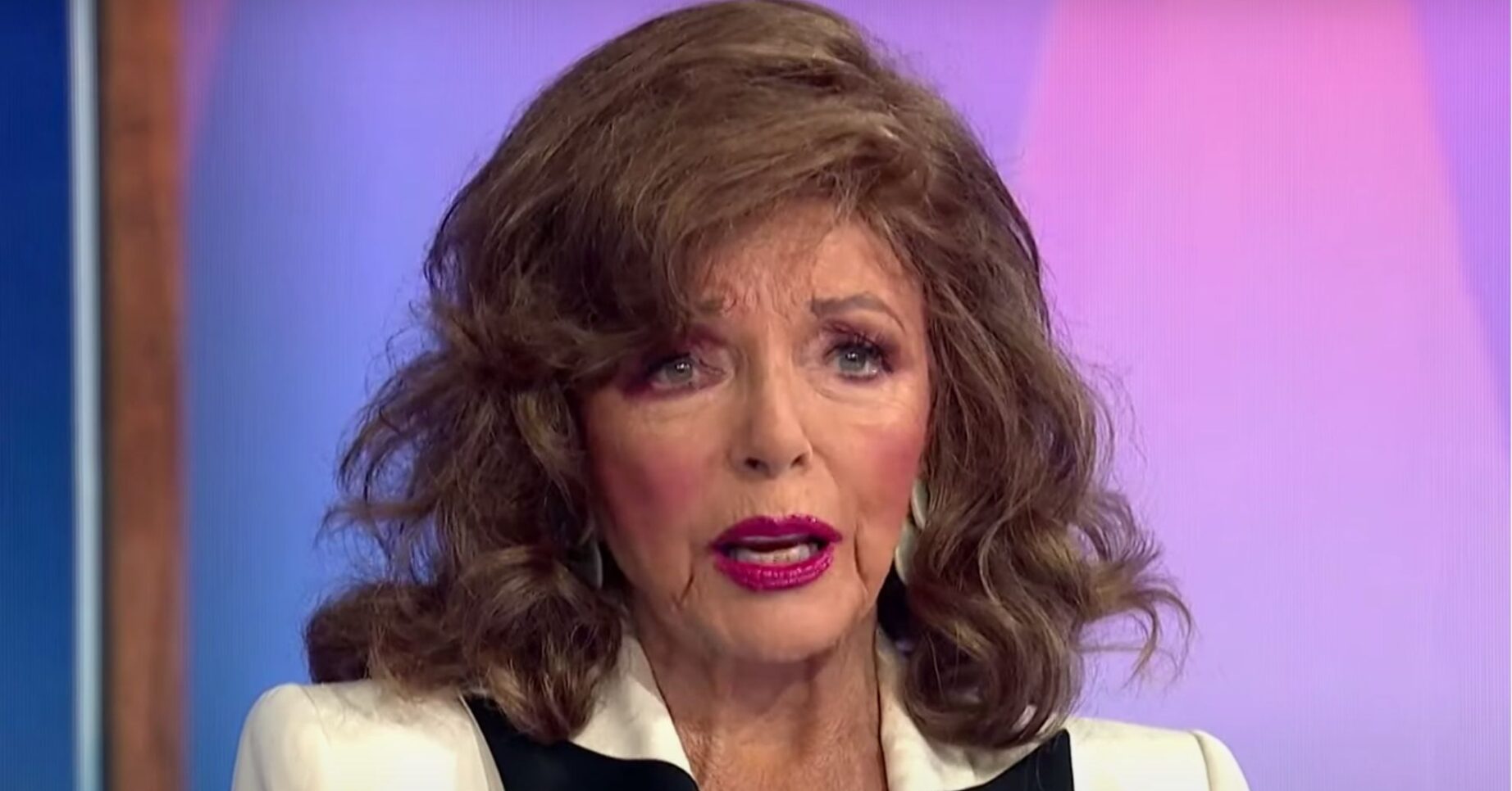 Joan Collins looks concerned