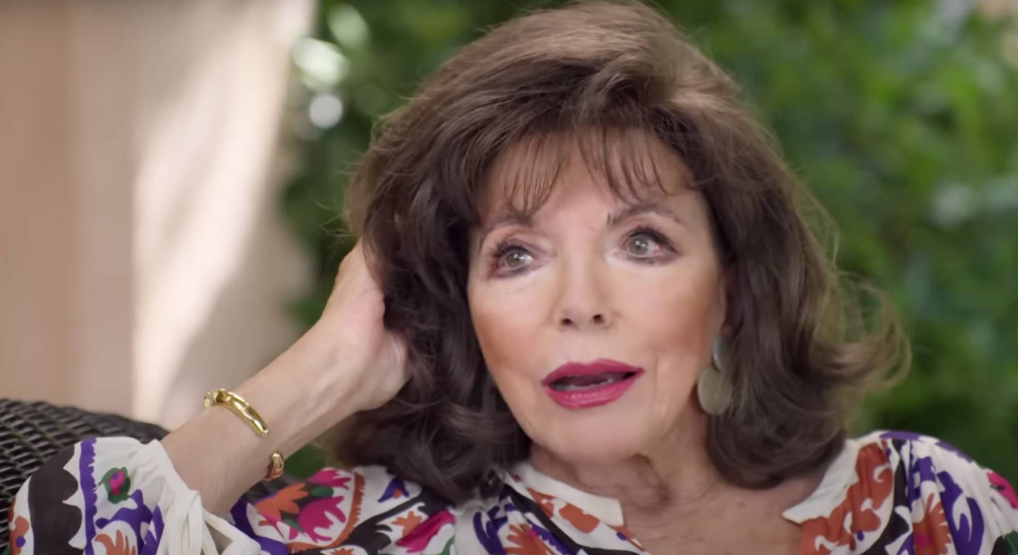 Joan Collins speaks