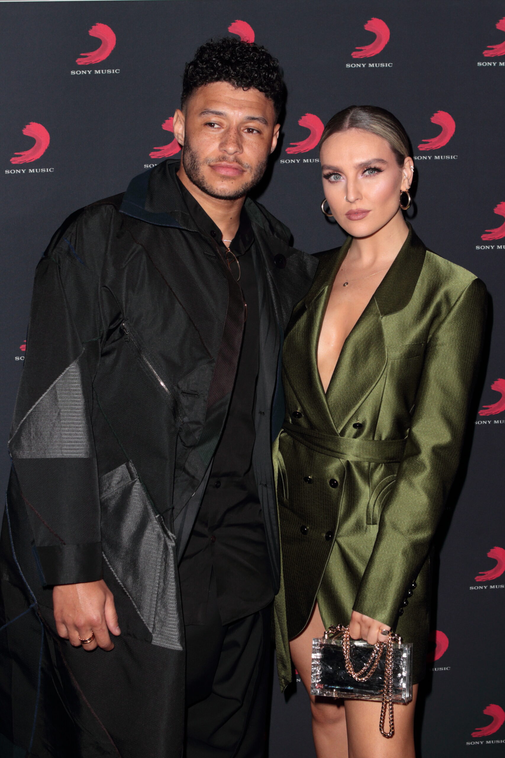 Alex Chamberlain and Perrie Edwards at event