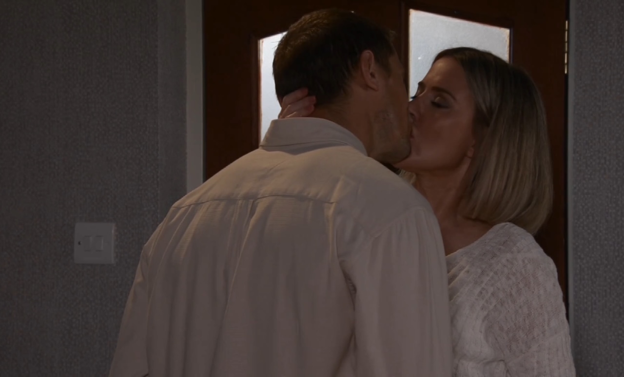 Coronation Street's Carl and Abi share a passionate kiss