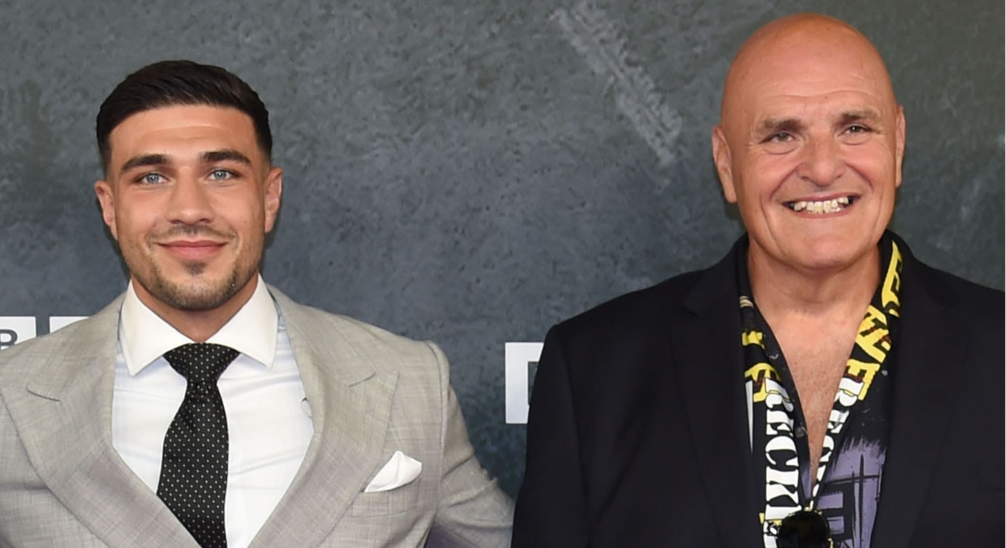 Tommy and John Fury smiling