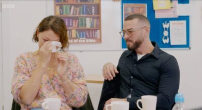 Emma Willis dabs her eyes with a hanky