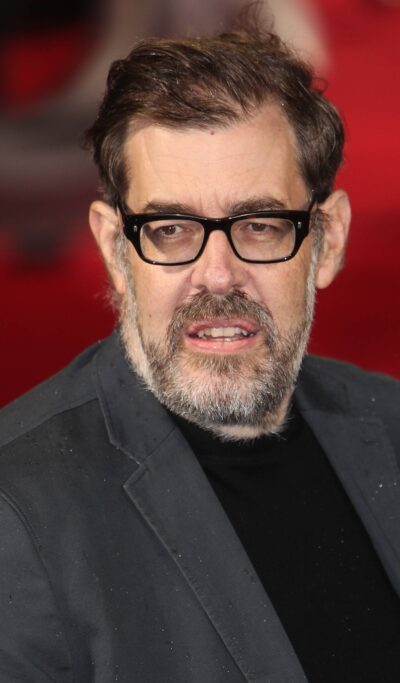 Richard Osman posing for pics