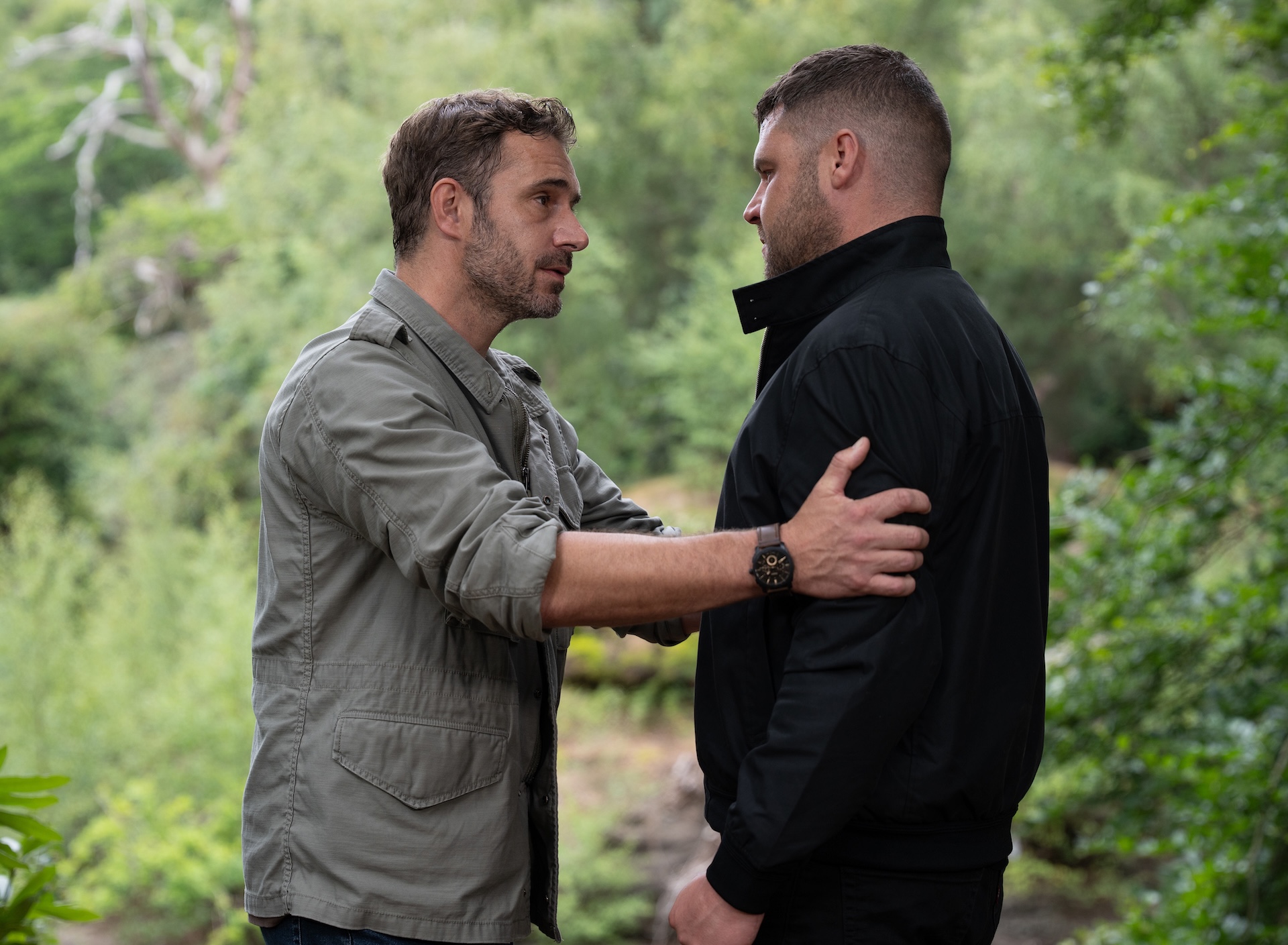 John Sugden grabs Aaron's shoulders in Emmerdale