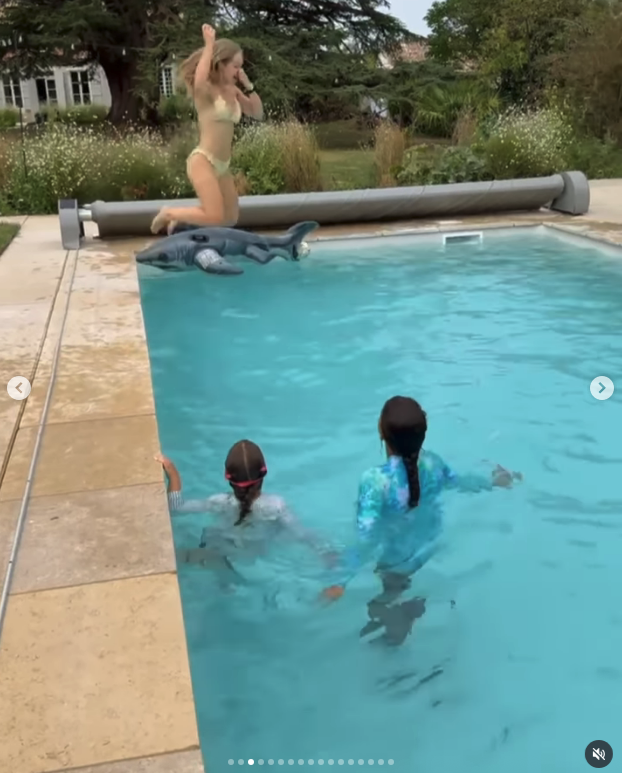 Katie Piper jumping in the swimming pool