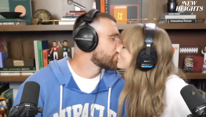 Travis Kelce and Taylor Swift kiss