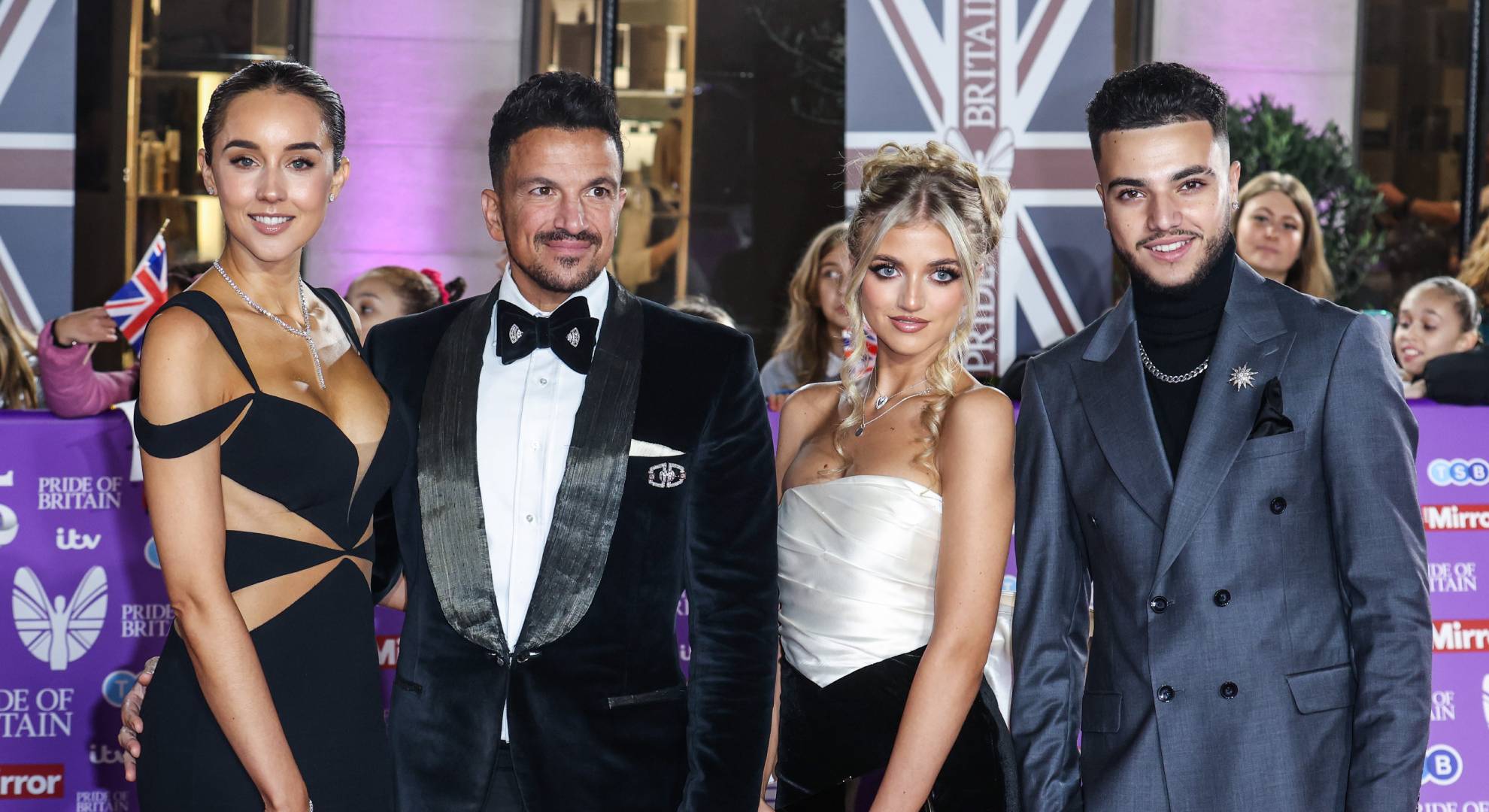 Emily Andre poses with children of Peter Andre