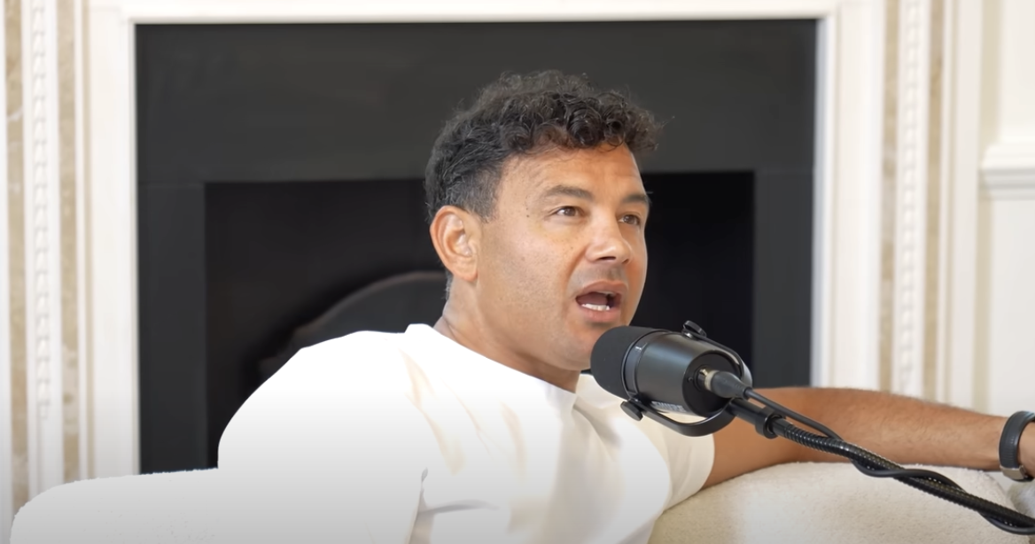 Ryan Thomas on podcast in white top