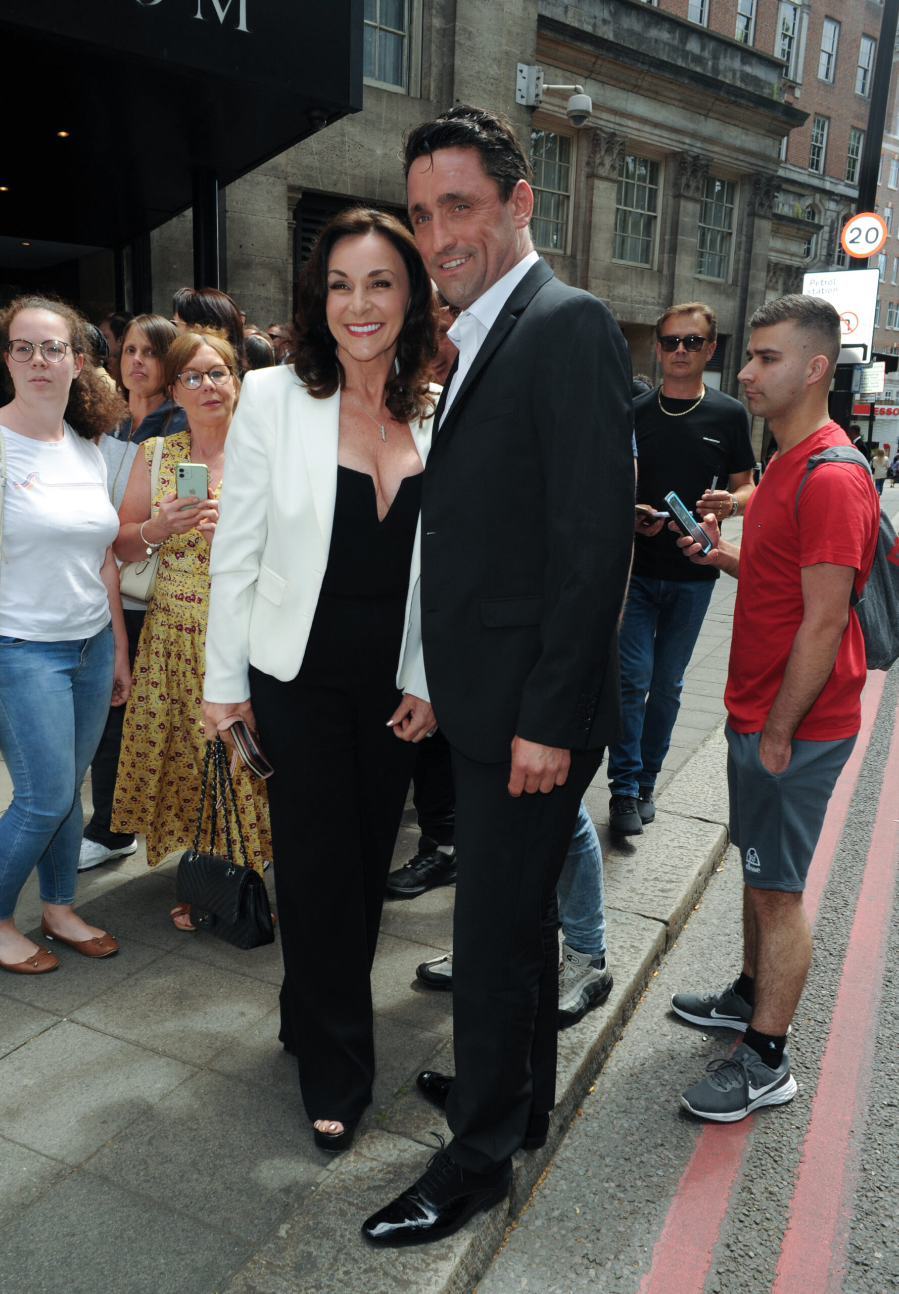 Shirley Ballas and Danny Taylor smiling in the street
