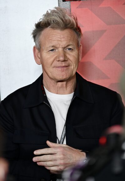 Gordon Ramsay on the red carpet eyes to camera